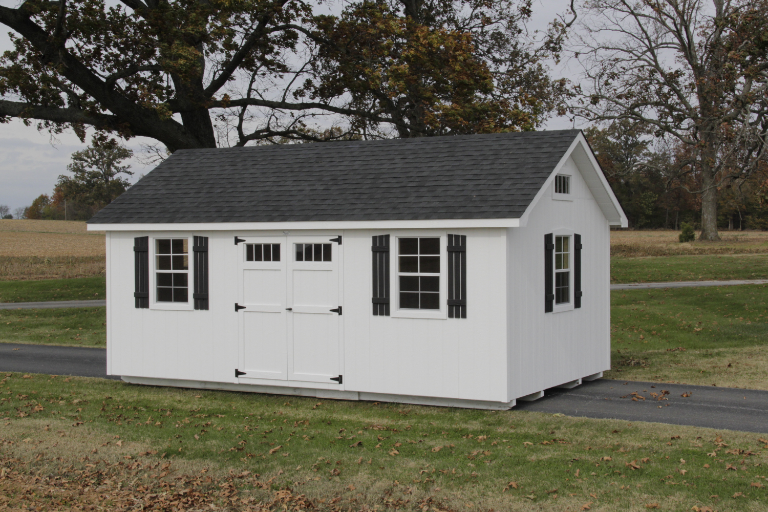 white 12x14 lancaster shed with double doors and windows