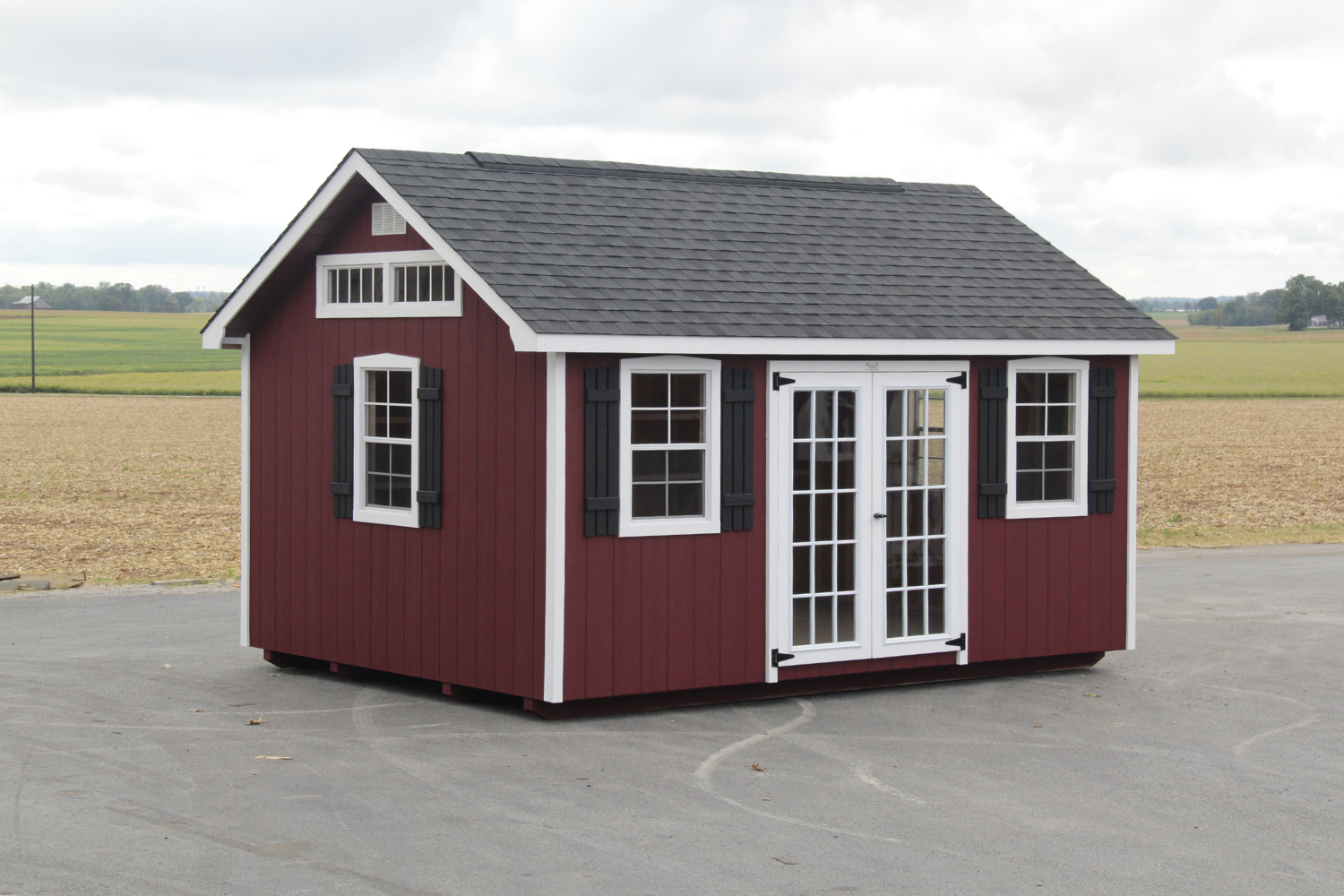 12x28 red lancaster shed with glass double doors and windows