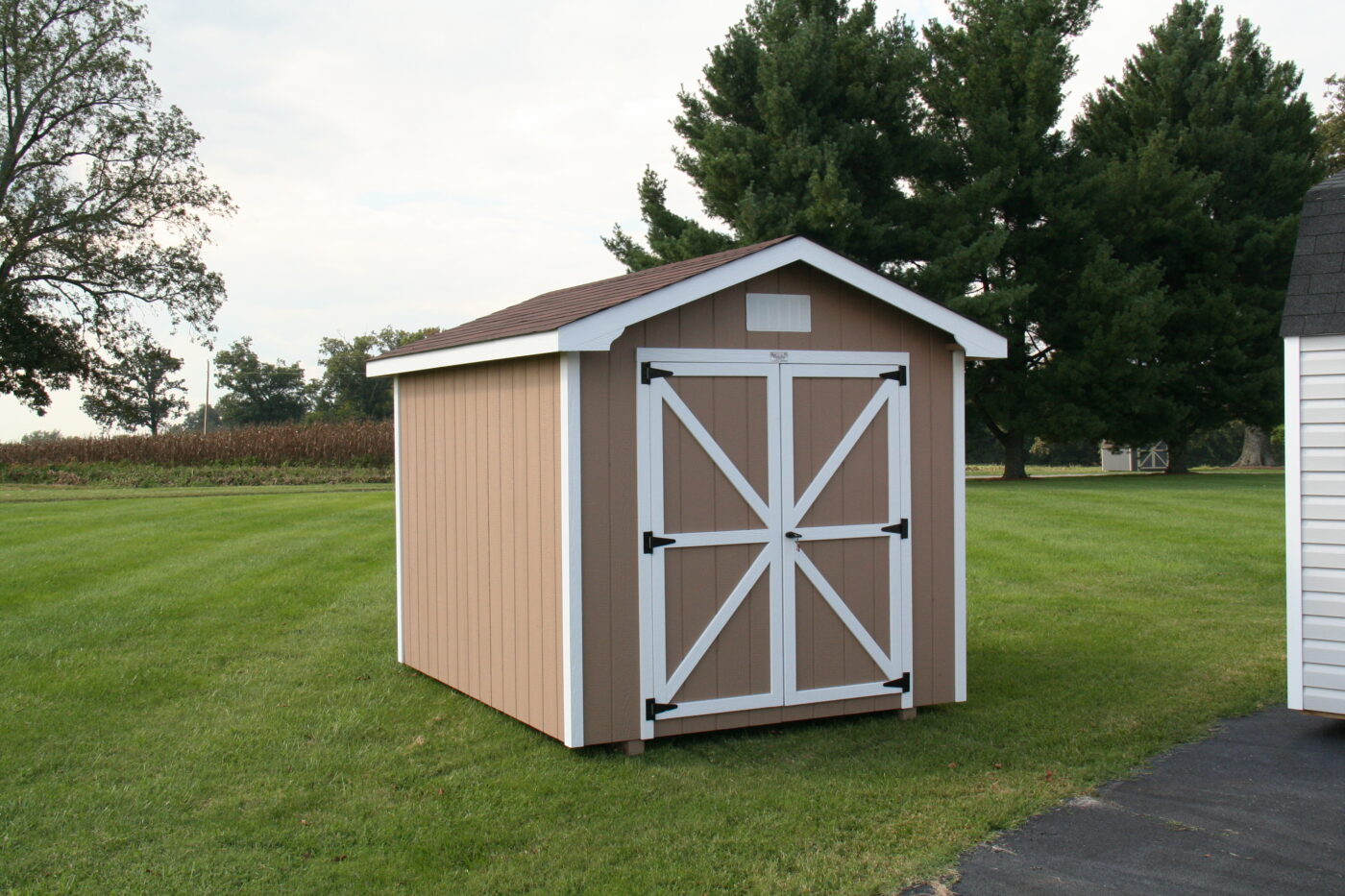 tan A-roof sheds in nashville TN with white trim