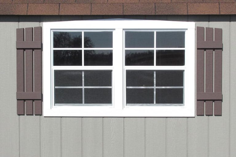 double window on a storage shed