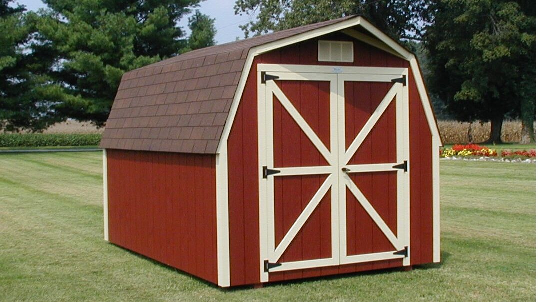red and tan trimmed barn shed