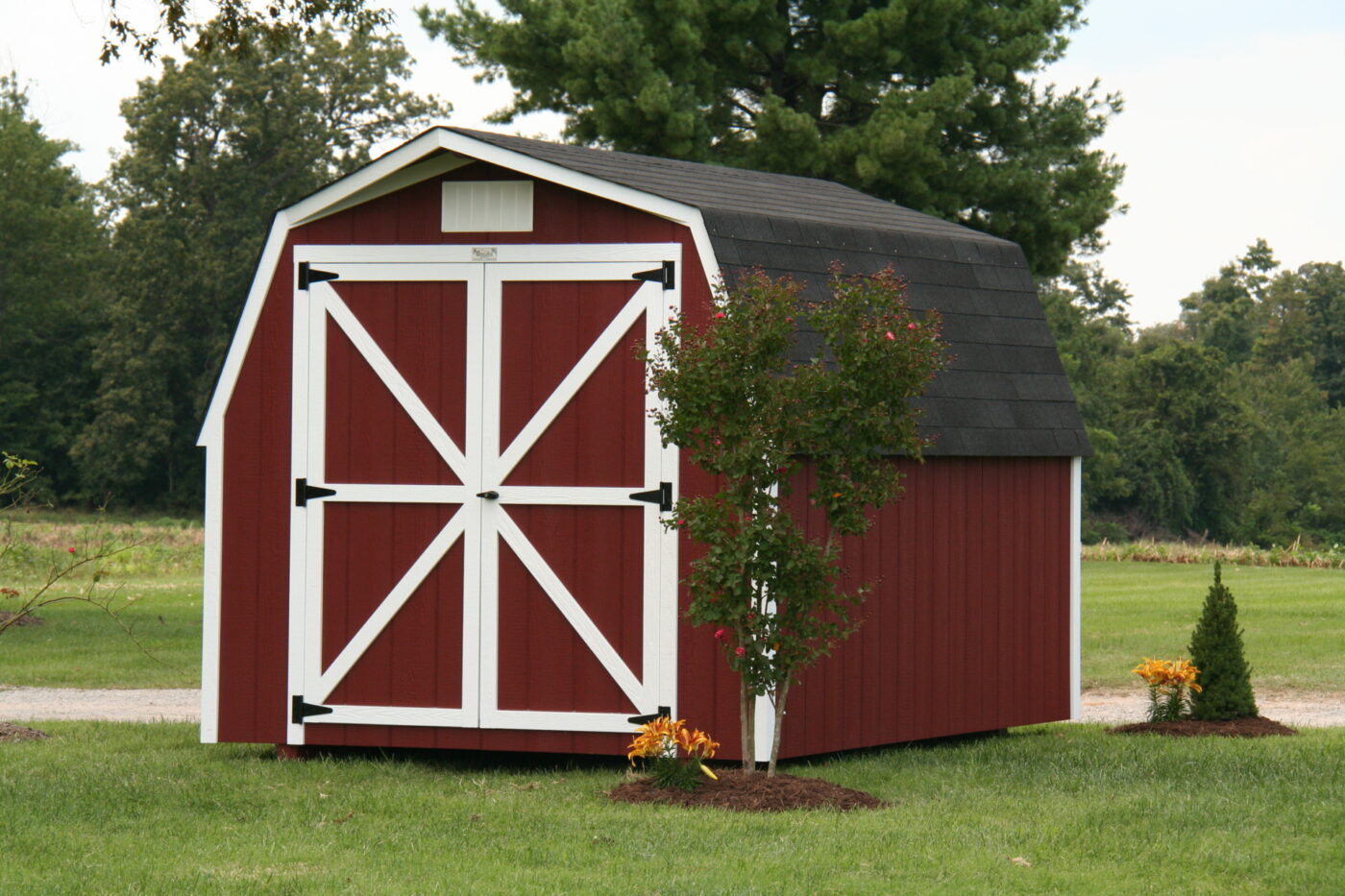 red and white barn style shed 