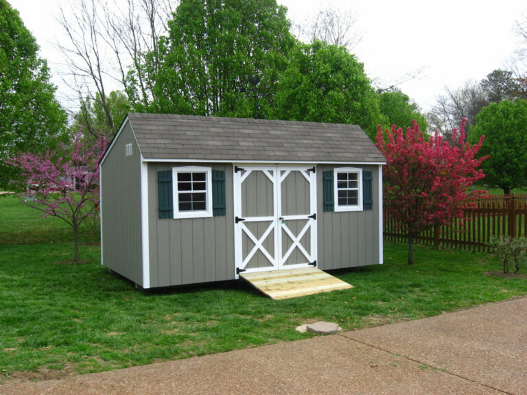 backyard shed with beautiful landscaping scaled