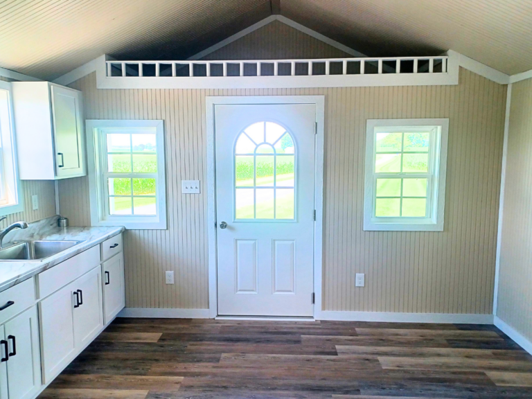 finished portable cabin with a loft and a kitchen with sitting area from overholt in TN and KY